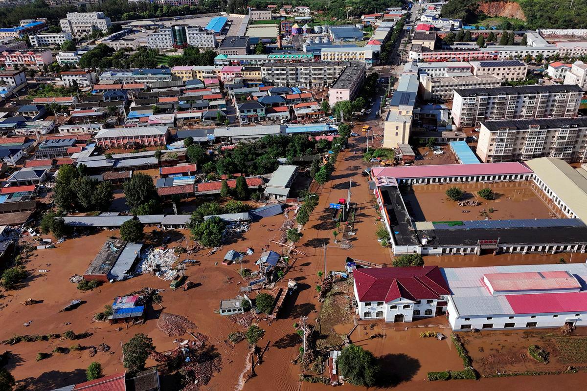 A drone view shows partially submerged village houses and other buildings after heavy rainfall flooded the area, in Miyun district of Beijing, China July 29, 2025. - REUTERSPIX