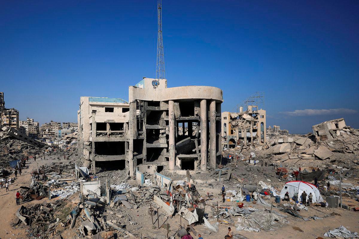 A view of the site surrounding an evacuated UNRWA clinic where displaced people were taking shelter, following an overnight Israeli strike, in Gaza City August 6, 2025. - REUTERSPIX