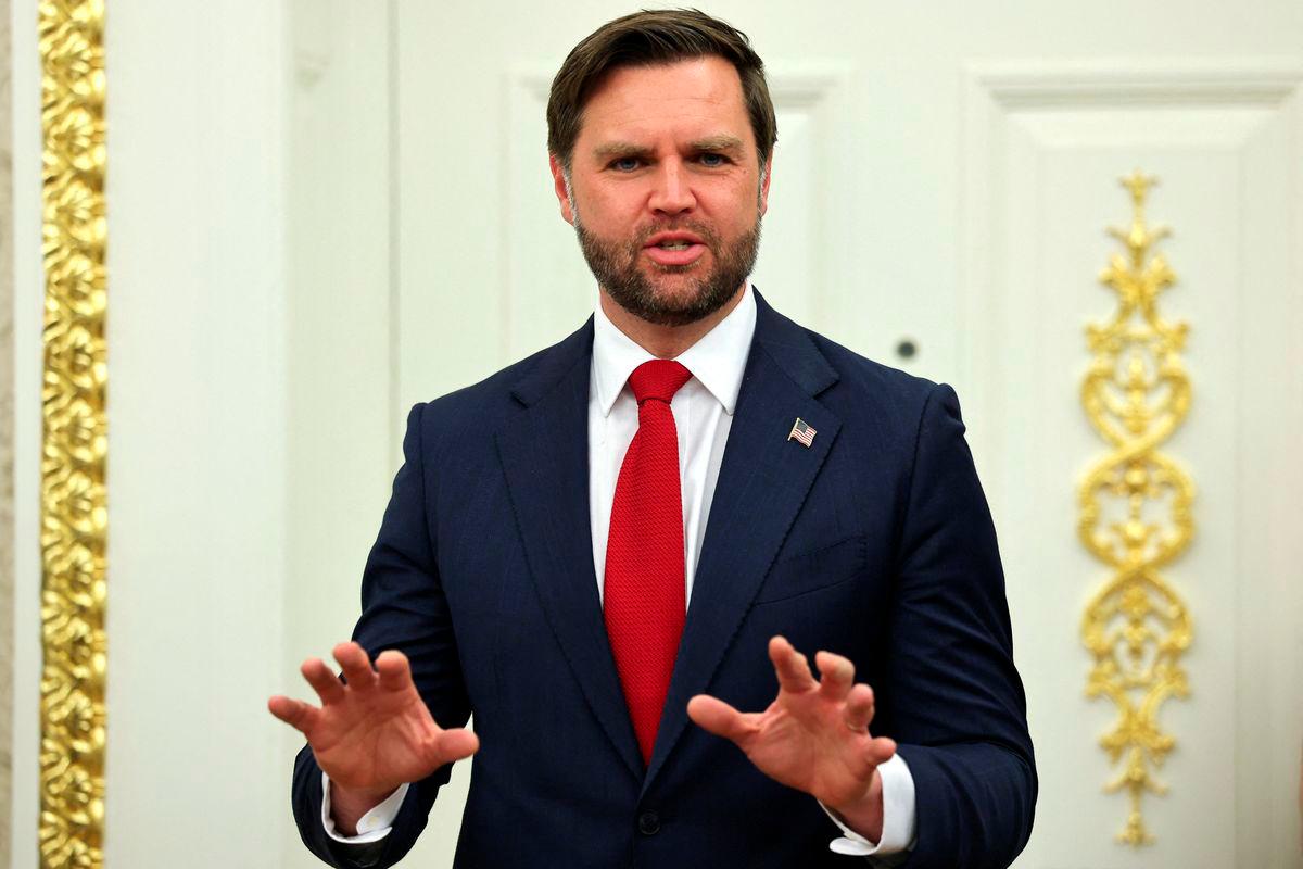U.S. Vice President JD Vance speaks as U.S. President Donald Trump (not pictured) and Apple CEO Tim Cook (not pictured) present Apple’s announcement of a $100 billion investment in U.S. manufacturing, in the Oval Office at the White House in Washington, D.C., U.S., August 6, 2025. REUTERS/Jonathan Ernst