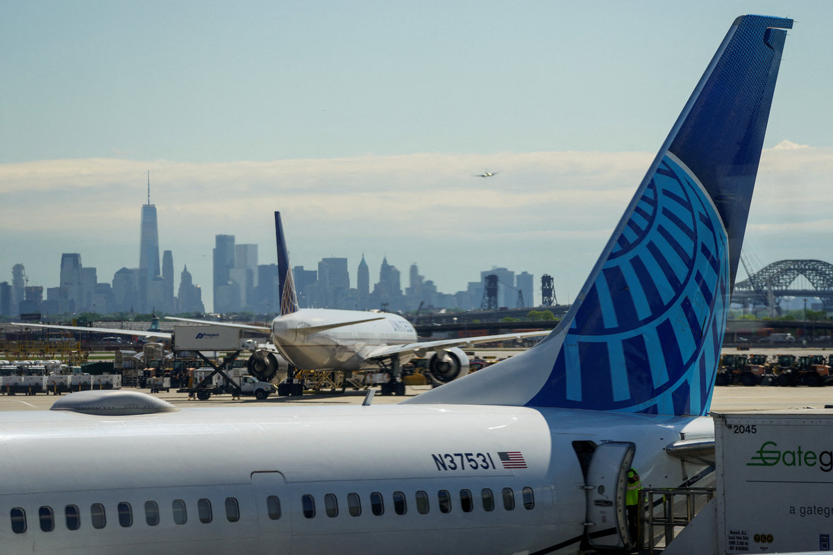 A view shows United Airlines at the tarmac at Newark International Airport, as the skyline of New York is seen in the background from Newark, New Jersey, U.S., May 7, 2025. - REUTERS