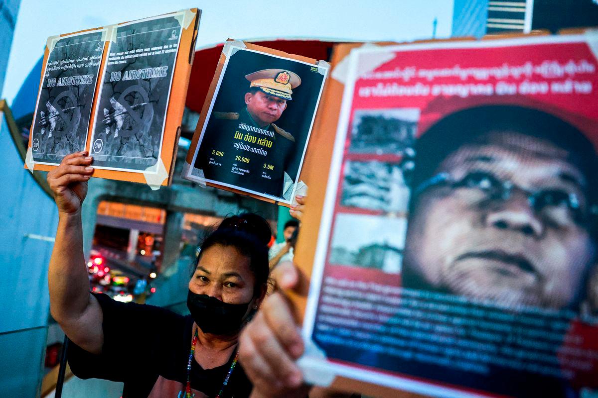 Activists hold up pictures of Myanmar's junta leader Min Aung Hlaing during a protest against his visit to Thailand and attending the 6th BIMSTEC Summit in Bangkok, Thailand, April 4, 2025. - REUTERSPIX