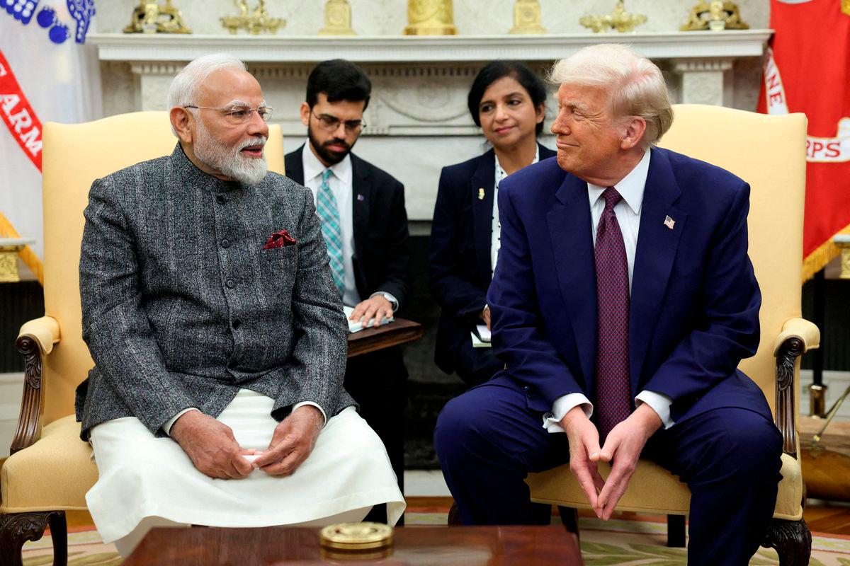 FILE PHOTO: U.S. President Donald Trump meets with Indian Prime Minister Narendra Modi at the White House in Washington, D.C., U.S., February 13, 2025. REUTERS/Kevin Lamarque/File Photo