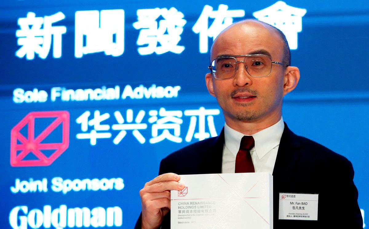 FILE PHOTO: Bao Fan, founder, Chairman and CEO of China Renaissance Group, an investment bank led by one of the country’s most famed rainmakers, holds a news conference on its IPO in Hong Kong, China September 13, 2018. REUTERS/Bobby Yip/File Photo