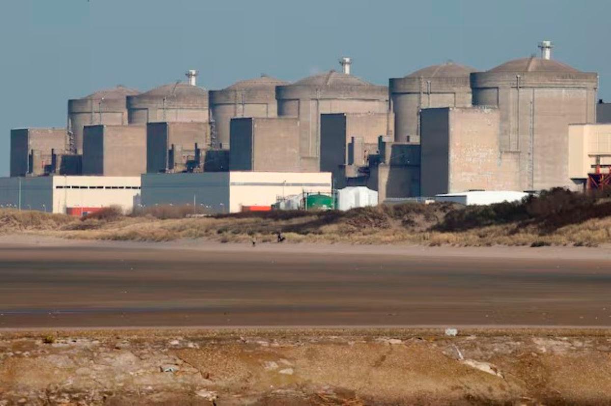 The Gravelines nuclear power plant is seen across the beach in Petit Fort Philippe, northern France, March 10, 2017. - REUTERS