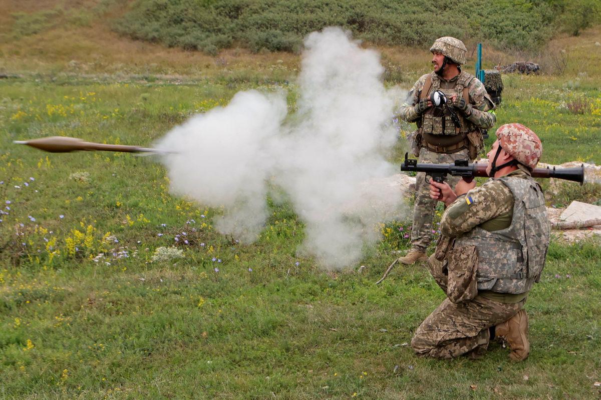 Service members of the 58th Separate Motorized Infantry Brigade of the Ukrainian Armed Forces use an RPG-7 grenade launcher during military exercises at a training ground, amid Russia's attack on Ukraine, in Kharkiv region, Ukraine August 11, 2025. - REUTERSPIX