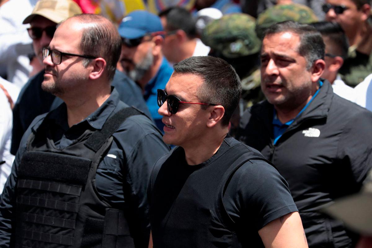 Ecuador's President Daniel Noboa walks with Ecuador’s Minister of Interior John Reinberg, as they take part in a protest march after the country's constitutional court temporarily suspended key parts of Noboa's security laws recently passed by the legislature, in Quito, Ecuador August 12, 2025. - REUTERSPIX