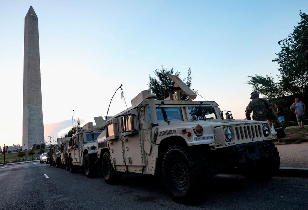 U.S. Army National Guard Humvees park near the Washington Monument after U.S. President Donald Trump announced a federal takeover of the Metropolitan Police Department under the Home Rule Act to assist with crime prevention in the nation's capital, Washington, D.C., August 12, 2025. - REUTERSPIX