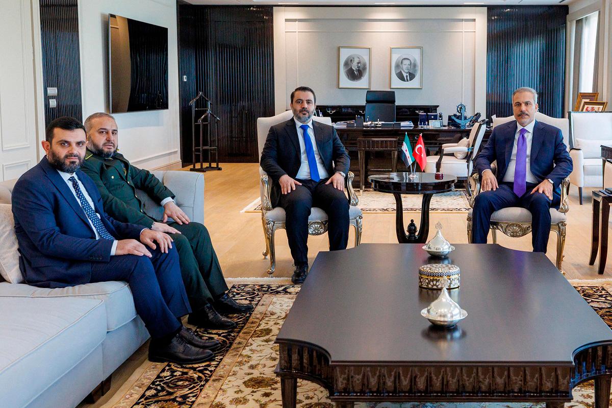 Syrian Foreign Minister Asaad Hassan al-Shibani, accompanied by General Intelligence Service Director Hussein Al-Salama and Defence Minister Murhaf Abu Qasra, meets with his Turkish counterpart Hakan Fidan in Ankara, Turkey, August 13, 2025. - Turkish Foreign Ministry/Handout via REUTERS