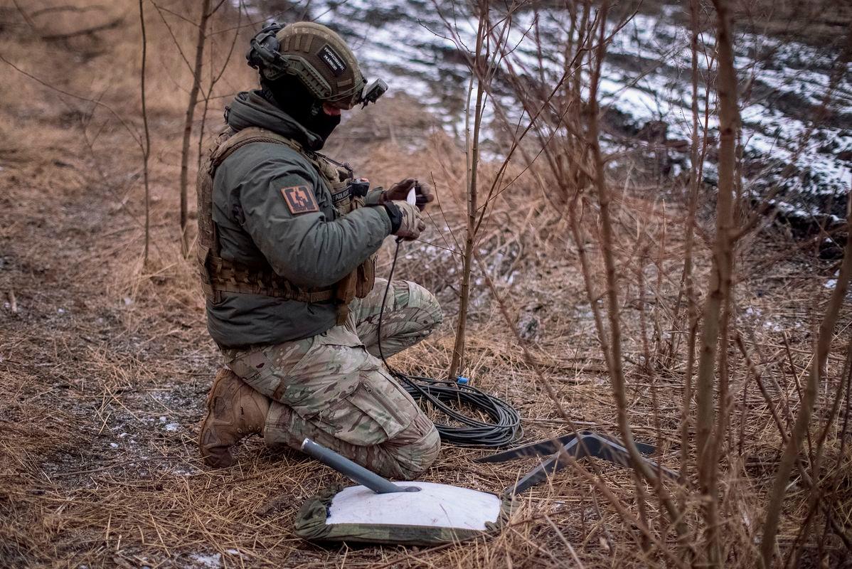 A Ukrainian serviceman of 47th brigade prepares a Starlink satellite internet systems at his positions at a front line, amid Russia’s attack on Ukraine, near the town of Avdiivka, recently captured by Russian troops in Donetsk region, Ukraine. Reuterspix