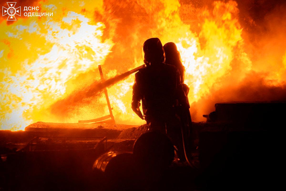Firefighters work at the site of a Russian drone strike, amid Russia’s attack on Ukraine, in Odesa, Ukraine in this handout picture released August 18, 2025. Press service of the State Emergency Service of Ukraine in Odesa region/Handout via REUTERS