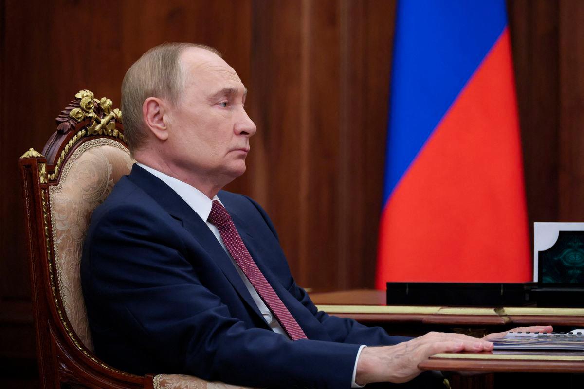 Russian President Vladimir Putin attends a meeting with Rostov Region Acting Governor Yury Slyusar at the Kremlin in Moscow, Russia August 18, 2025. Sputnik/Vyacheslav Prokofyev/Pool via REUTERSPIX