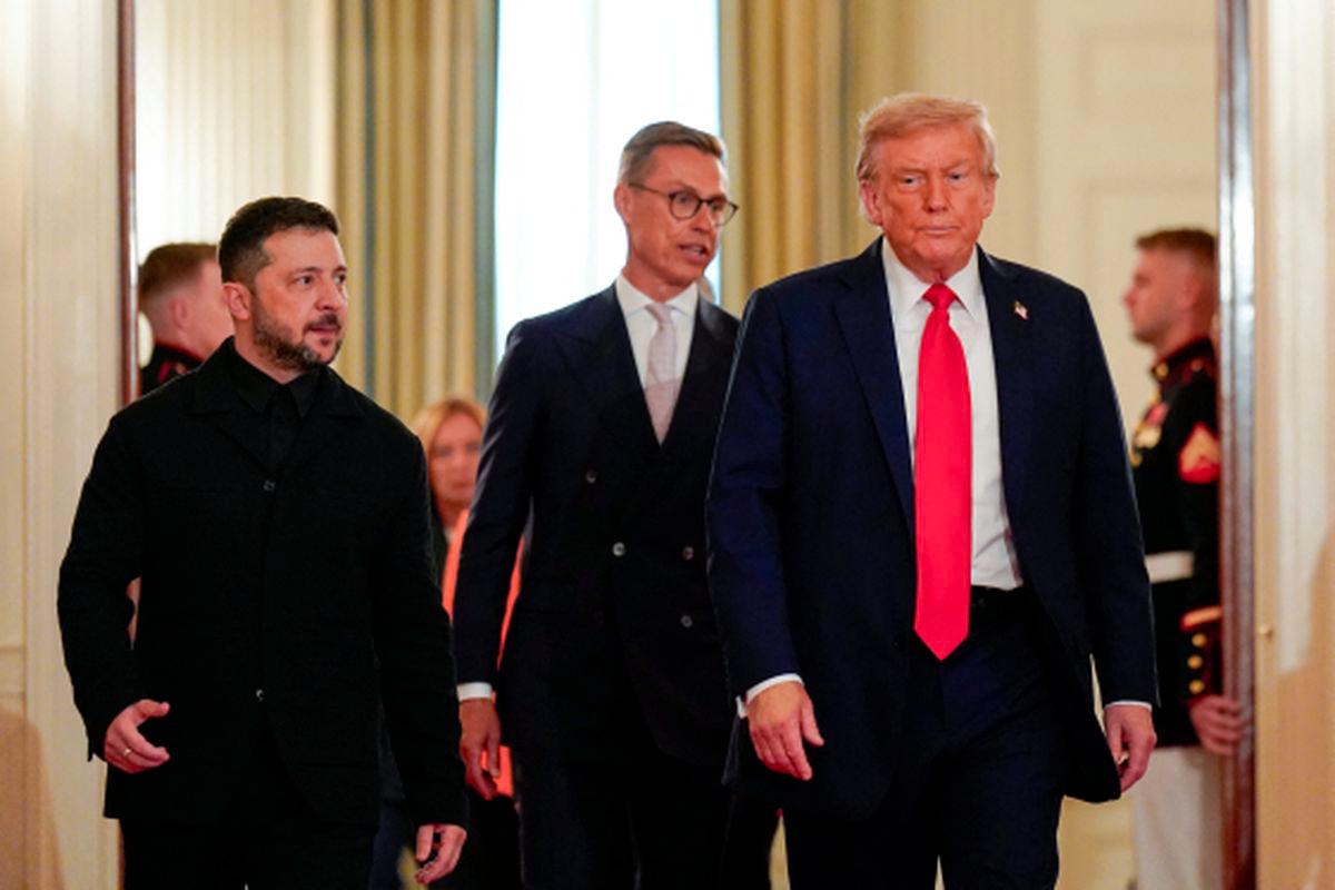 U.S. President Donald Trump and Ukrainian President Volodymyr Zelenskiy walk during a meeting, amid negotiations to end the Russian war in Ukraine, at the White House in Washington, D.C., U.S., August 18, 2025. - REUTERSPIX