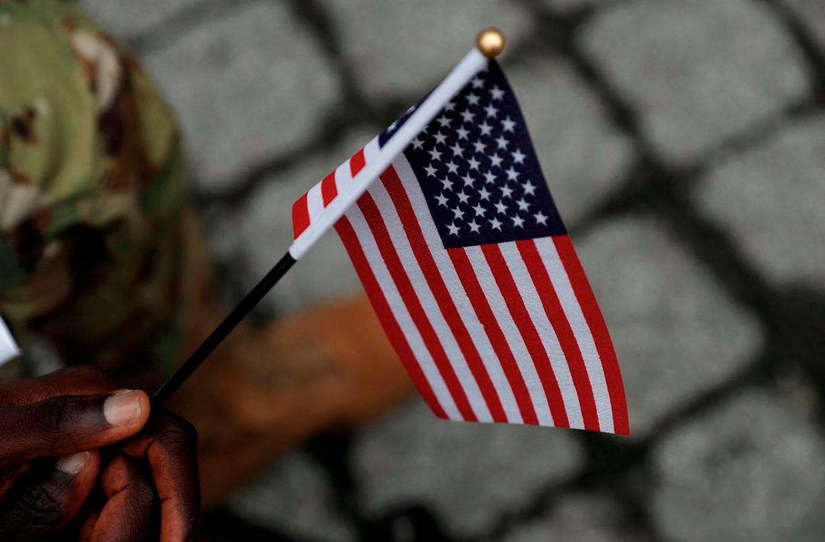A U.S. Citizenship and Immigration Services (USCIS) naturalization ceremony in New York City, U.S., September 17, 2021. - REUTERS