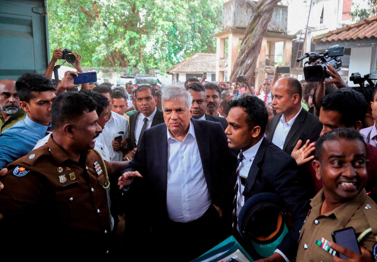Sri Lanka's former President Ranil Wickremesinghe arrives at the Magistrate’s Court in Colombo, Sri Lanka, August 22, 2025. - REUTERS