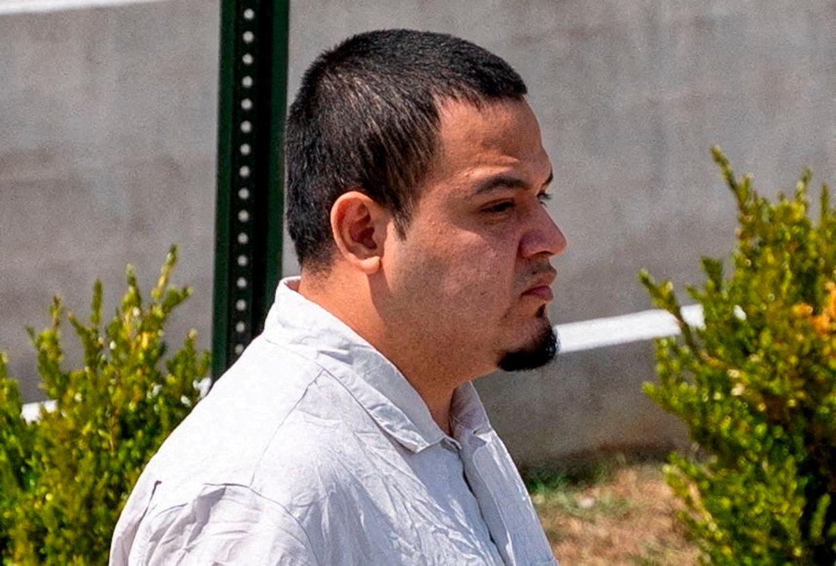 FILE PHOTO: Kilmar Abrego Garcia walks after he has been released from the Putnam County Jail in Cookeville, Tennessee, U.S., August 22, 2025. REUTERS/Seth Herald/File Photo