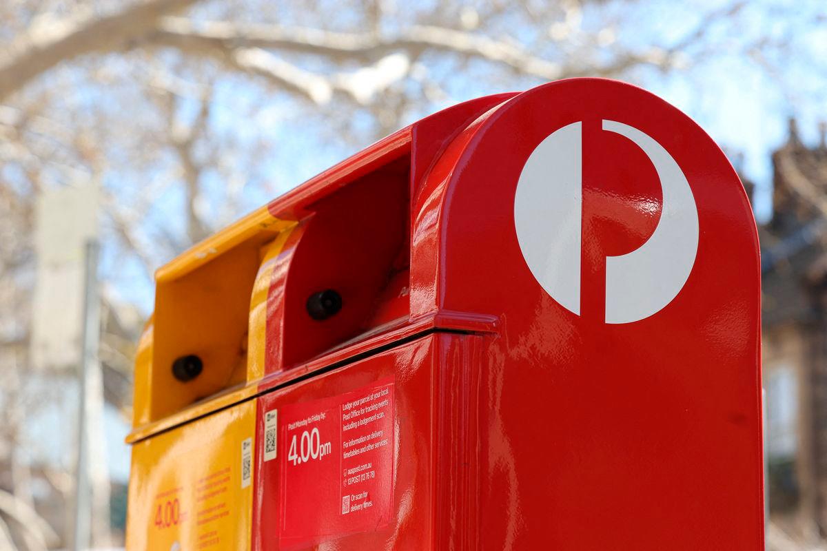 An Australia Post red street posting box stands alongside an express post box in Sydney, Australia, August 26, 2025. Reuterspix