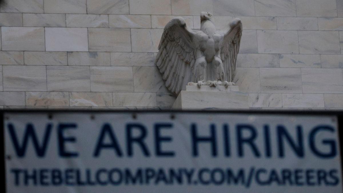 An eagle tops the U.S. Federal Reserve building's facade above a We Are Hiring notice from construction company renovating the building, as U.S. President Donald Trump said he was firing Federal Reserve Governor Lisa Cook over alleged improprieties in obtaining mortgage loans, in Washington, D.C., U.S., August 26, 2025. - REUTERSPIX
