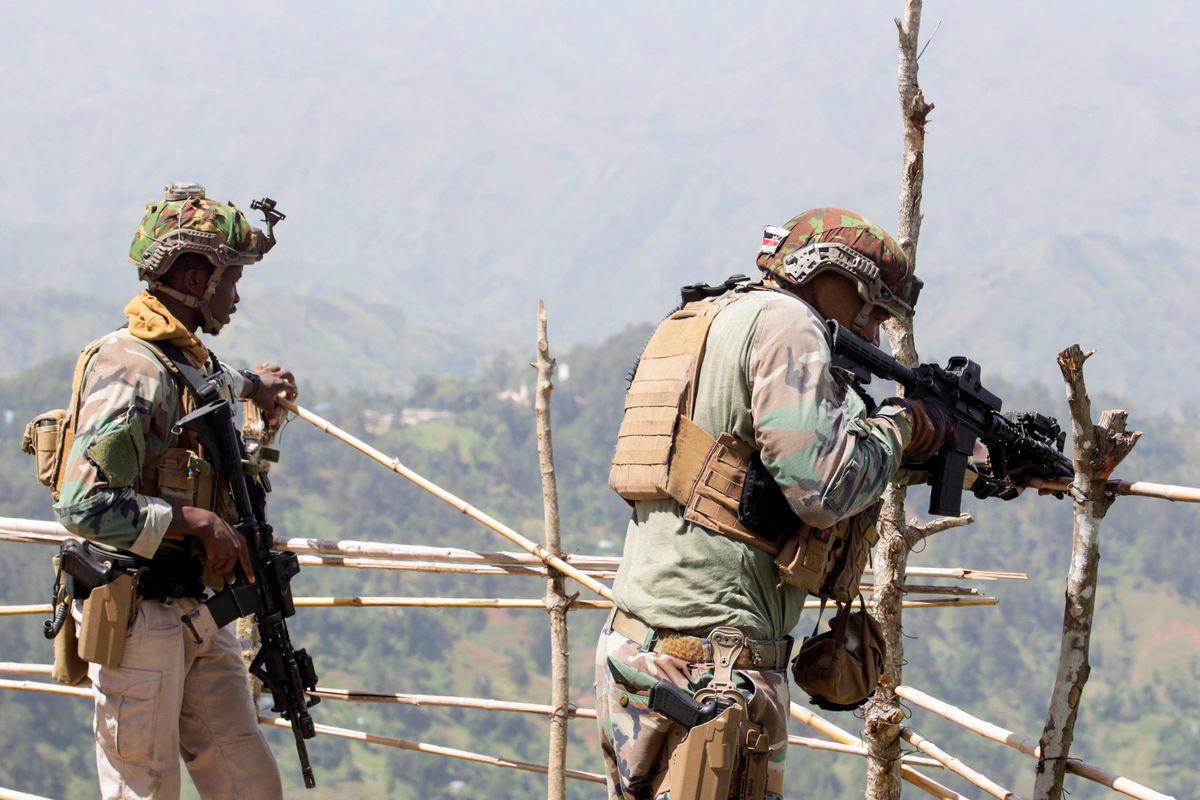 Kenyan security forces patrol from a mountainside after an operation by the Haitian National Police and the Multinational Security Support (MSS) mission to recapture the Teleco communications site and surrounding community from armed gangs, on the outskirts of Port-au-Prince, in Kenscoff, Haiti August 26, 2025. REUTERS/Jean Feguens Regala