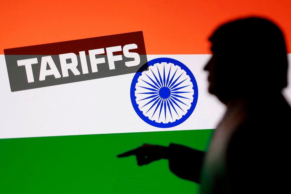 For representational purposes only: FILE PHOTO: Indian flag, 3D-printed miniature model depicting U.S. President Donald Trump and the word “Tariffs”, are seen in this illustration taken August 27, 2025. REUTERS/Dado Ruvic/Illustration/File Photo