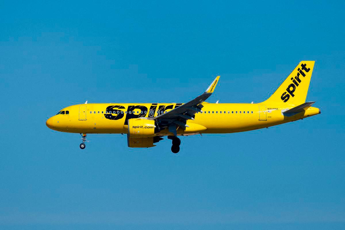 FILE PHOTO: A Spirit commercial airliner prepares to land at San Diego International Airport in San Diego, California, U.S., January 18, 2024. REUTERS/Mike Blake/File Photo