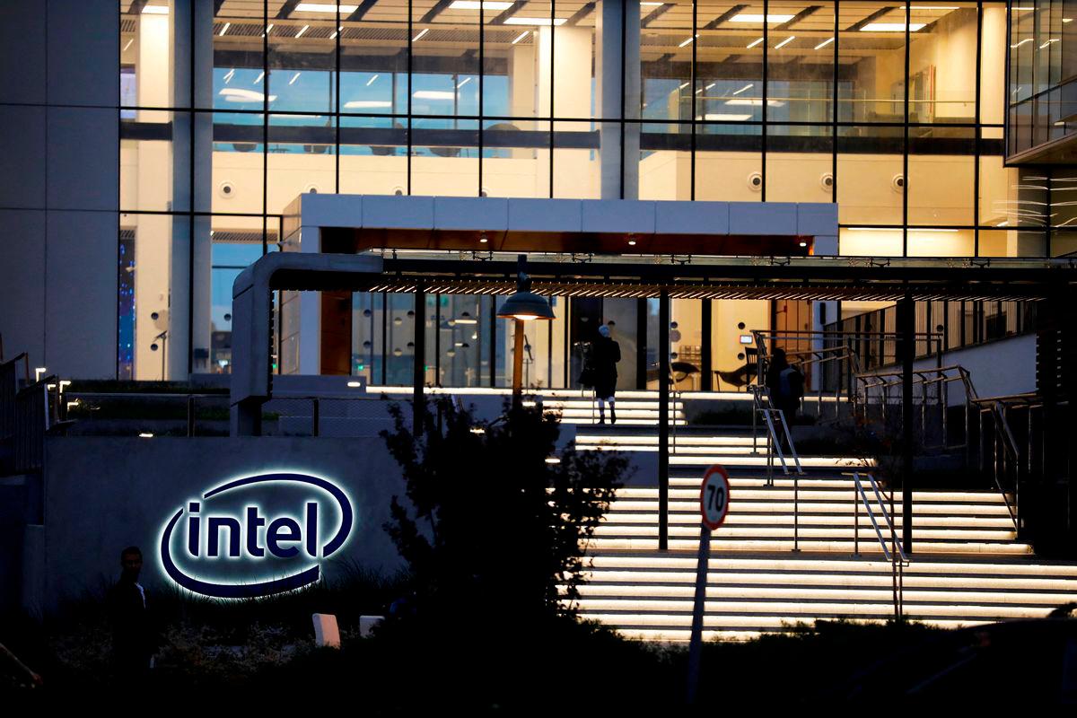 FILE PHOTO: U.S. chipmaker Intel Corp’s logo is seen at the entrance to their “smart building” in Petah Tikva, near Tel Aviv, Israel December 15, 2019. REUTERS/Amir Cohen/File Photo