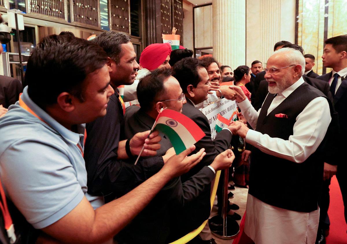India’s Prime Minister Modi is welcomed by the Indian community upon his arrival for the Shanghai Cooperation Organisation (SCO) Summit at the hotel in Tianjin, China August 30, 2025. India’s Press Information Bureau/Handout via REUTERS