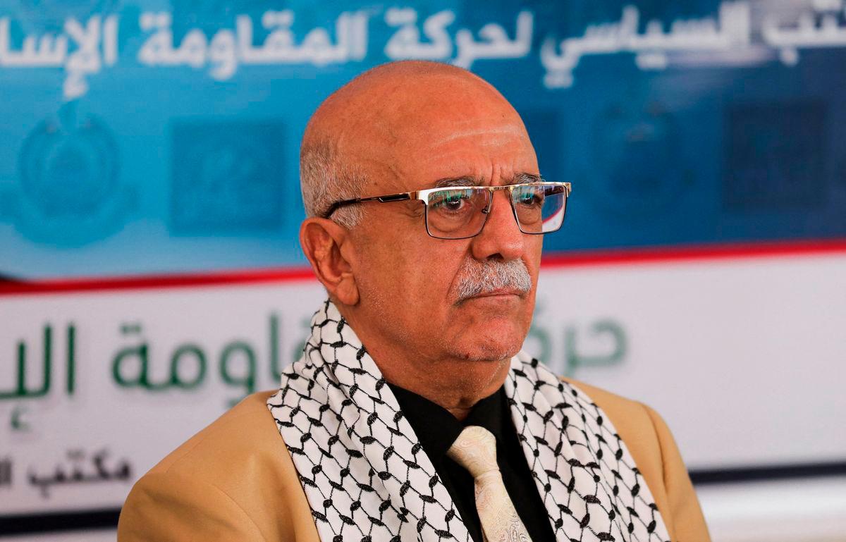 FILE PHOTO: Head of the Houthi-led government Ahmad al-Rahawi looks on during a visit by Houthi government officials to the Hamas office in Sanaa, Yemen August 19, 2024. REUTERS/Khaled Abdullah/File Photo