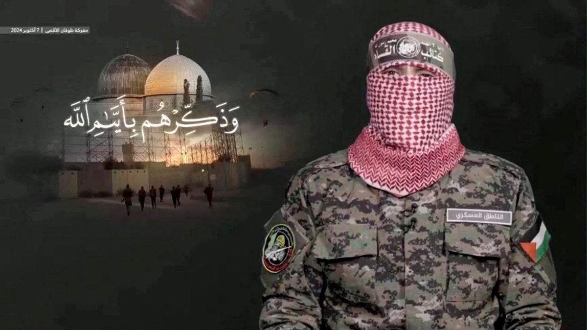 FILE PHOTO: A masked person said to be Abu Ubaida, the military spokesperson of Hamas’ armed wing, the al-Qassam Brigades, speaks commemorating the one year anniversary of the October 7, 2023 attack against Israel, at a location given as Gaza, in this screengrab from handout video released October 7, 2024. Hamas Armed Wing Media/Handout via REUTERS/File Photo