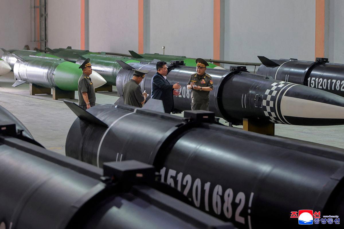 North Korean leader Kim Jong Un inspects a new missile production line at a military enterprise at an undisclosed location in this undated picture released by North Korea's official Korean Central News Agency, September 1, 2025. - KCNA via REUTERSPIX