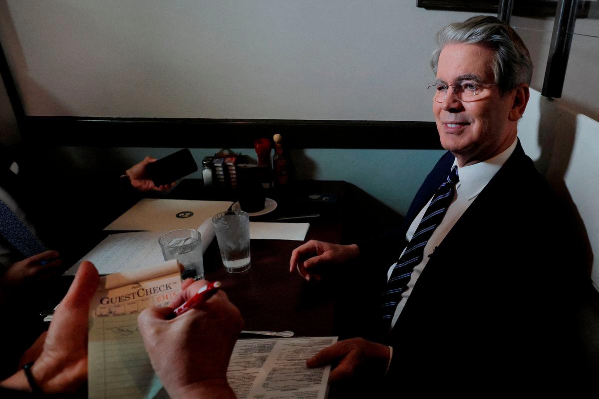 U.S. Secretary of the Treasury Scott Bessent orders food during a Labor Day visit to McLean Family Restaurant in McLean, Virginia, U.S., September 1, 2025. - REUTERSPIX