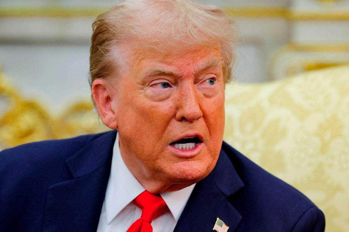 U.S. President Donald Trump reacts as he and the President of Poland Karol Nawrocki (not pictured) meet in the Oval Office at the White House in Washington, D.C., U.S., September 3, 2025. - REUTERSPIX