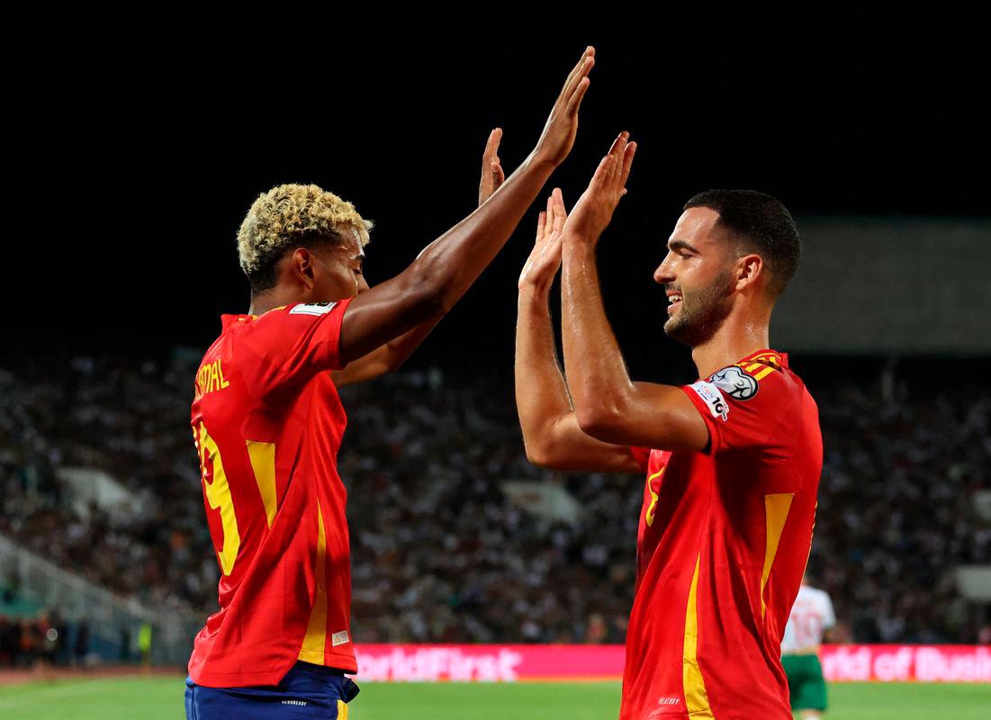 Spain’s Mikel Merino celebrates scoring their third goal with Spain’s Lamine Yamal REUTERSPix