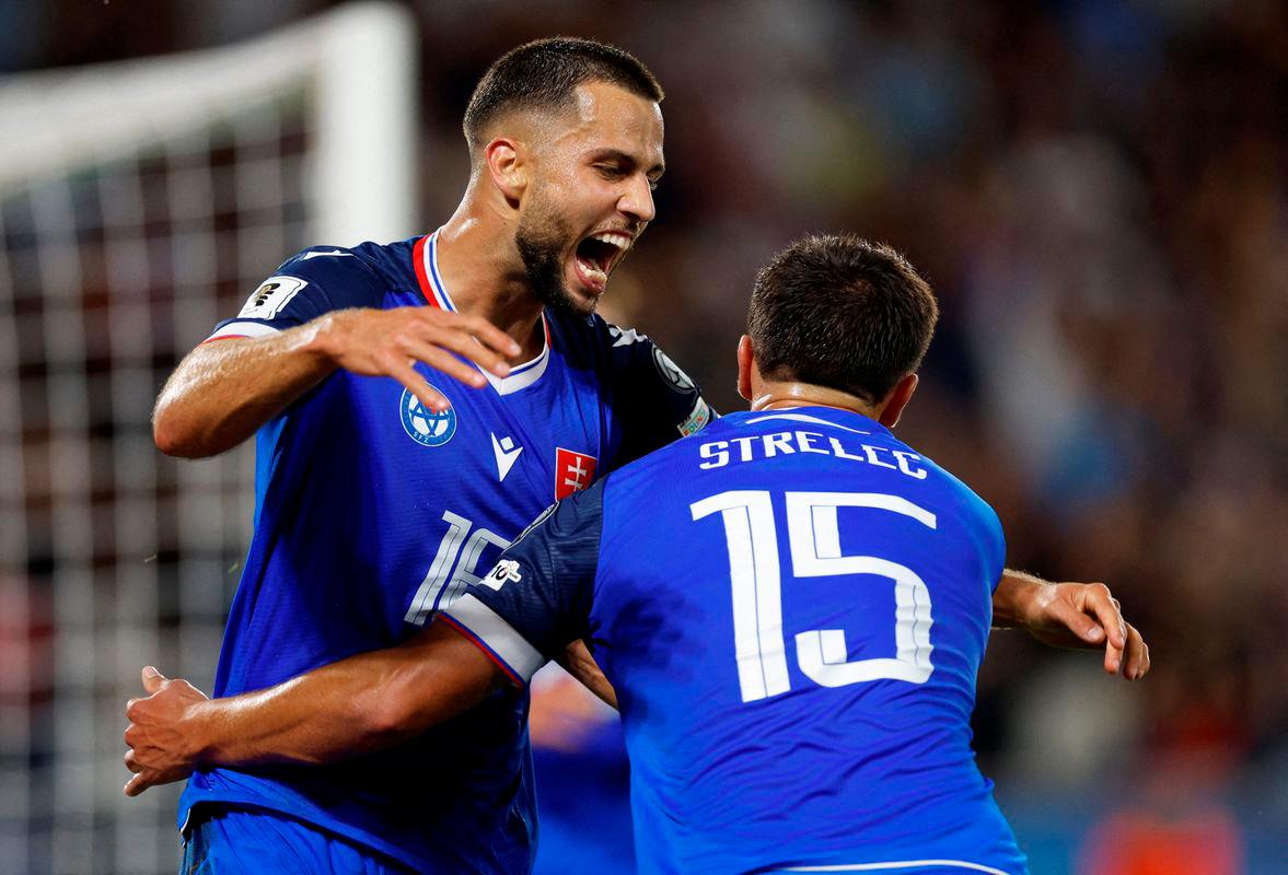 Slovakia’s David Hancko celebrates scoring their first goal with David Strelec. Reuterspix