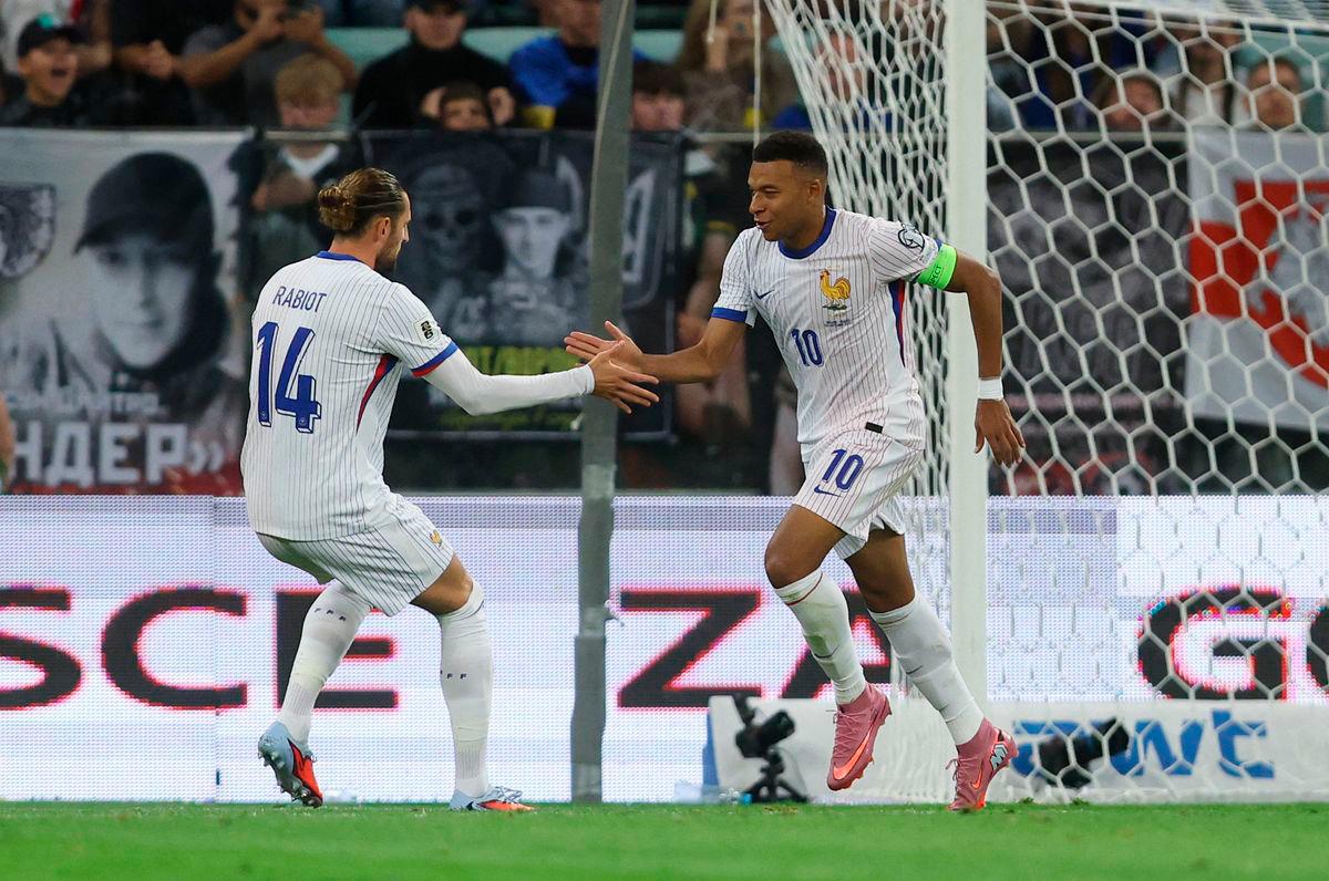 France’s Kylian Mbappe celebrates scoring their second goal with Adrien Rabiot REUTERSPix