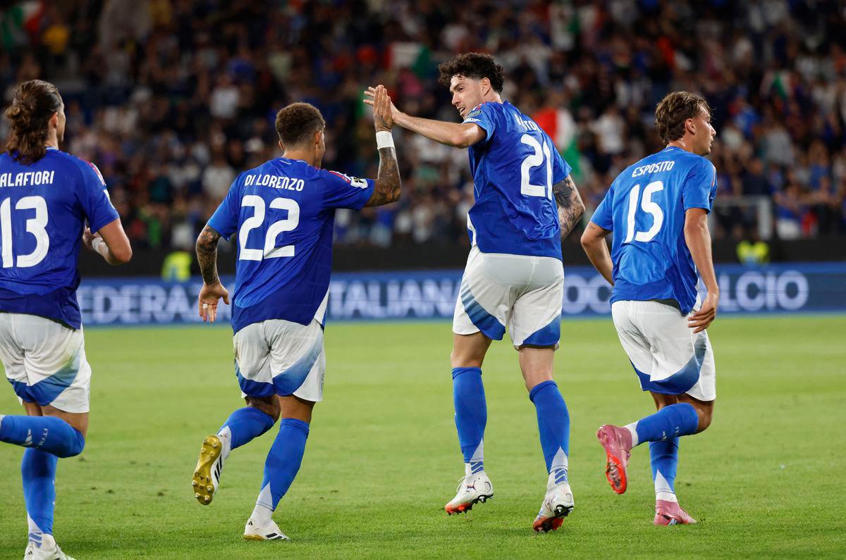 Italy’s Alessandro Bastoni celebrates scoring their fifth goal with Giovanni Di Lorenzo REUTERSPix