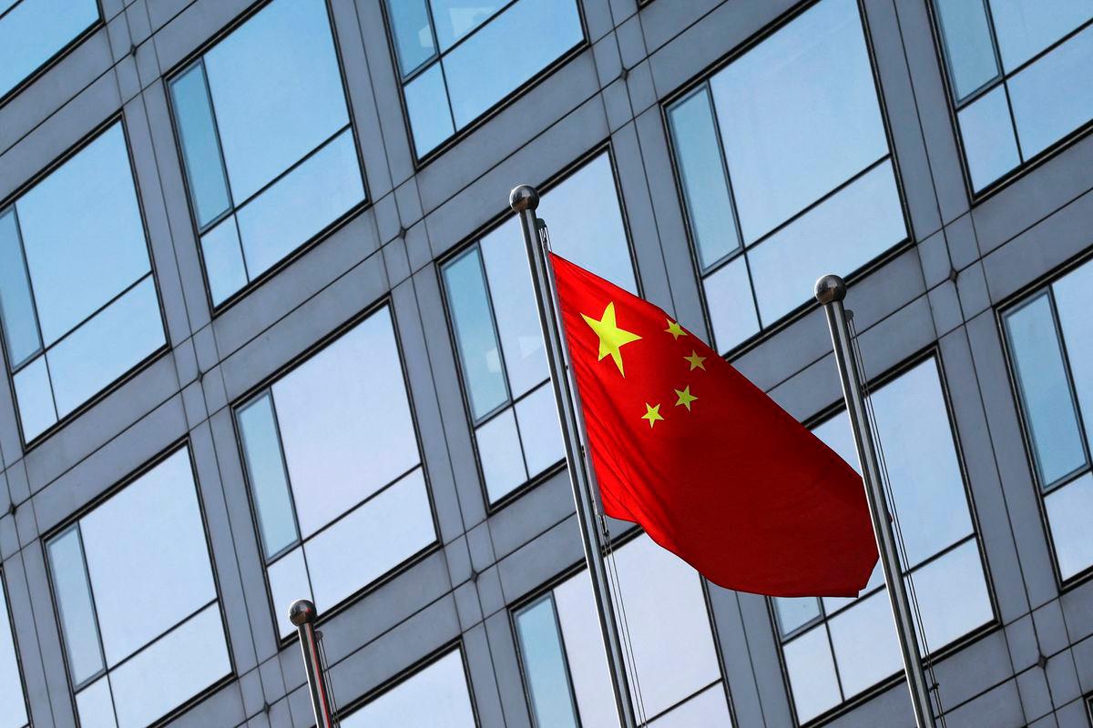 For representational purposes only: FILE PHOTO: A Chinese flag flutters outside the China Securities Regulatory Commission (CSRC) building on the Financial Street in Beijing, China February 8, 2024. REUTERS/Florence Lo/File Photo