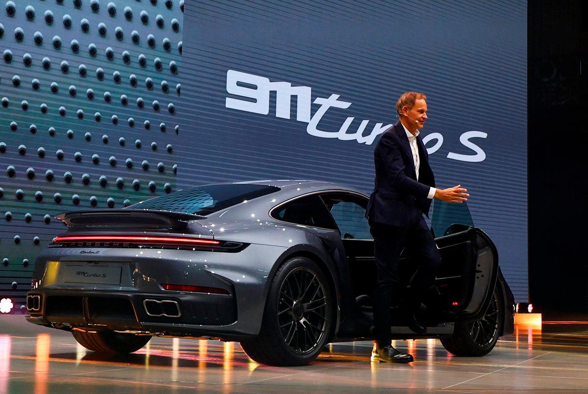 Oliver Blume, CEO of Volkswagen arrives in the new Porsche 911 Turbo S, during a media preview ahead of the IAA Munich auto show, in Munich, Germany, September 7, 2025. REUTERS/Kai Pfaffenbach