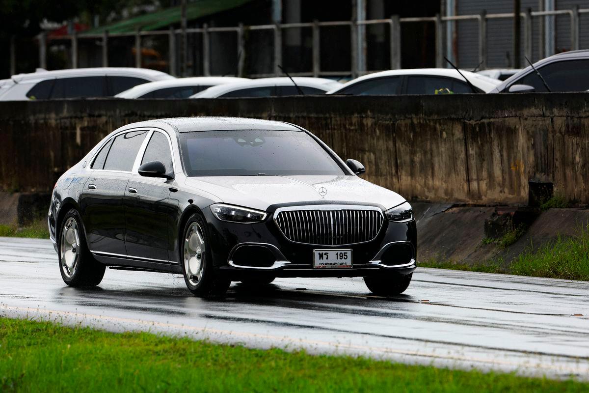 A car in the motorcade believed to be carrying Thailand’s former Prime Minister Thaksin Shinawatra drives by after leaving a private jet terminal at Bangkok’s Don Mueang International Airport, after he flew out of the country for what he claimed was a medical check-up in Dubai ahead of a key court case, in Bangkok, Thailand, September 8, 2025. REUTERS/Chalinee Thirasupa