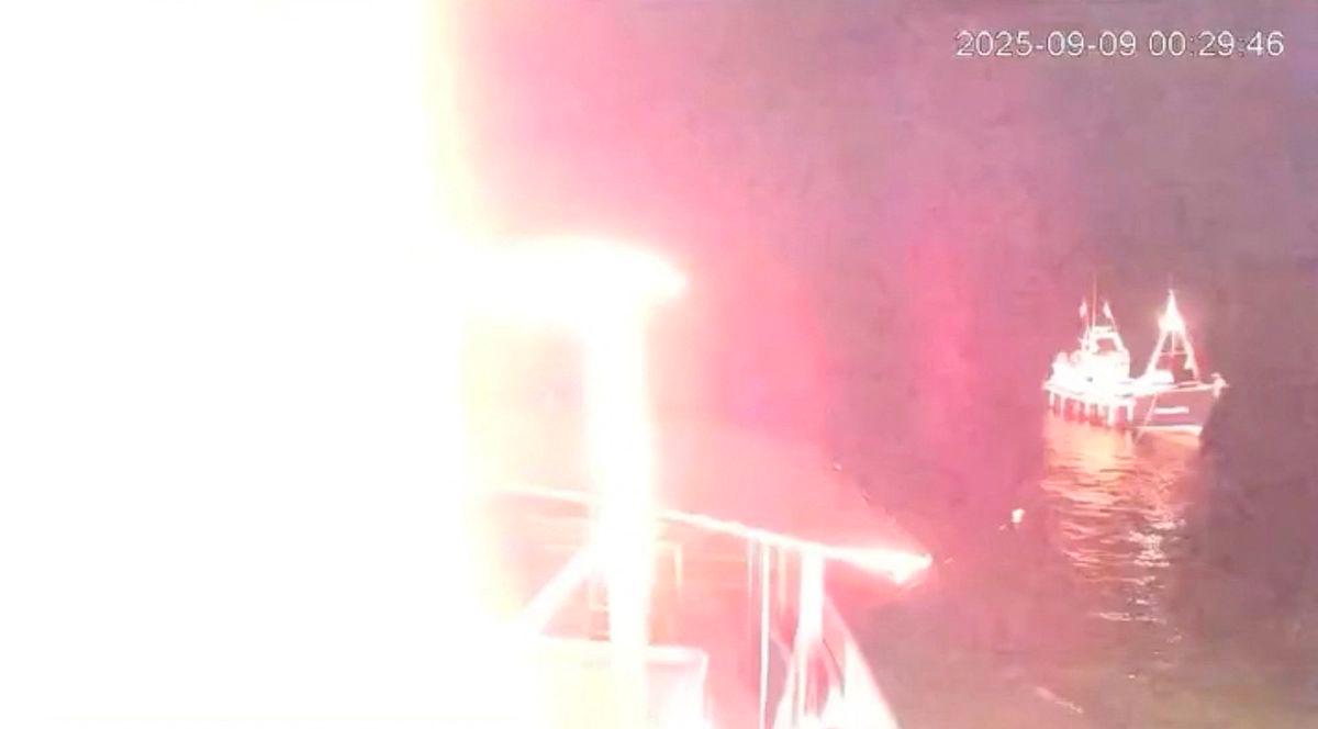 A CCTV footage shows a glow from a fire that struck a vessel of the Global Sumud Flotilla (GSF) in the Tunisian waters off the coast of Tunisia, September 8, 2025, in this screengrab obtained from a handout video. - Global Sumud Flotilla/Handout via REUTERSPIX