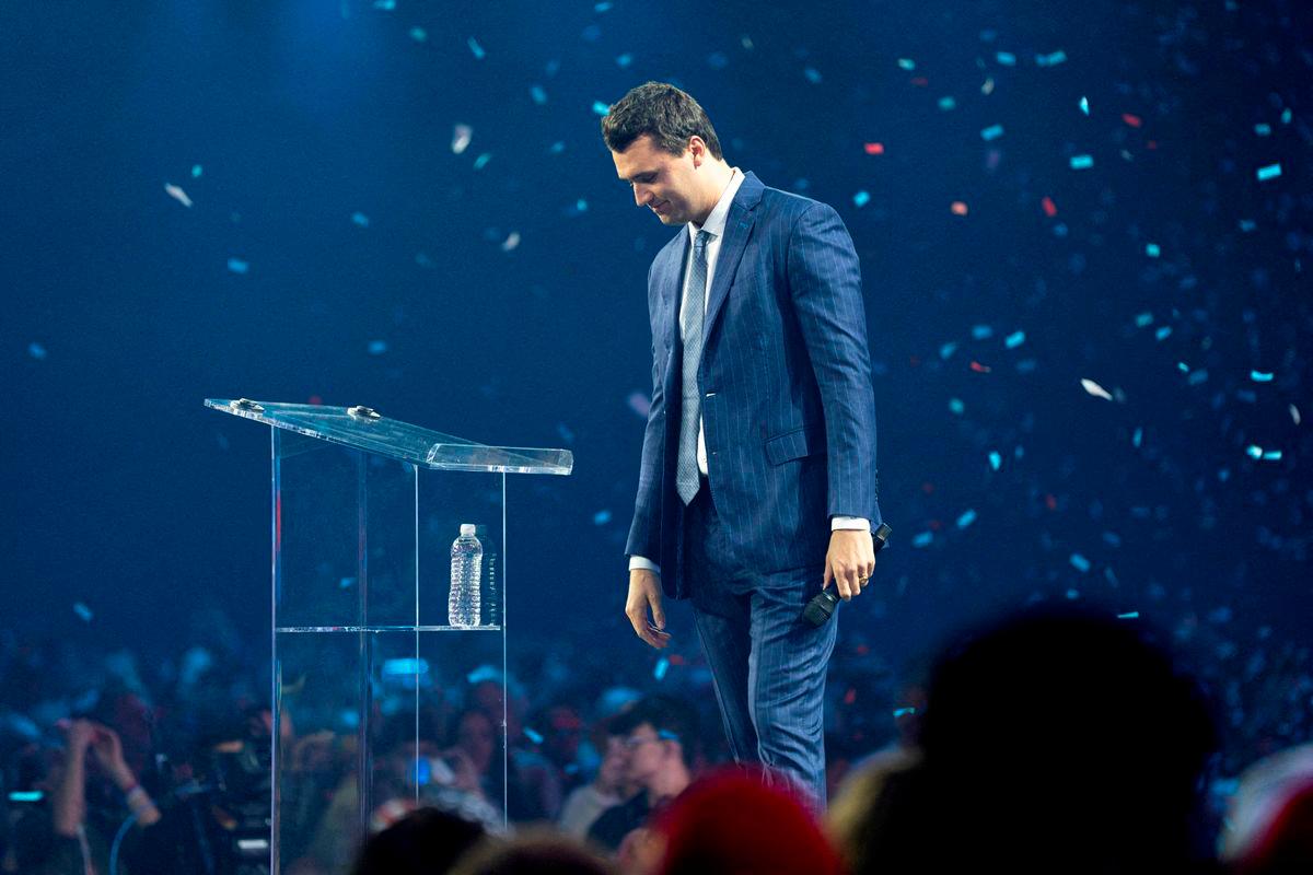 FILE PHOTO: Charlie Kirk, Turning Point USA founder, greets the crowd during the AmericaFest 2024 conference sponsored by conservative group Turning Point in Phoenix, Arizona, U.S. December 19, 2024. REUTERS/Cheney Orr/File Photo/File Photo