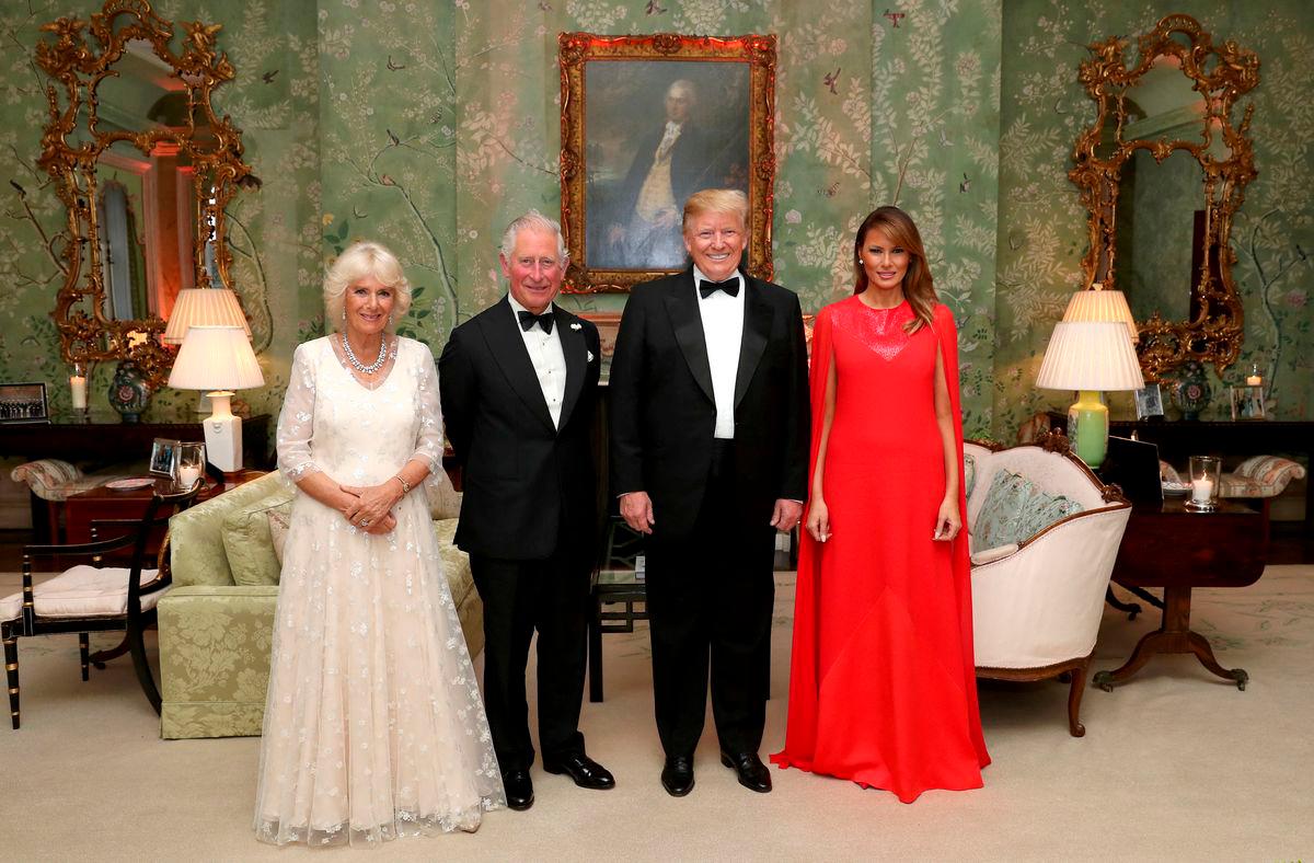 FILE PHOTO: U.S. President Donald Trump and first lady Melania Trump host a dinner for Britain’s Charles, Prince of Wales and Camilla, Duchess of Cornwall, at Winfield House, during their state visit in London, Britain June 4, 2019. Chris Jackson/Pool via REUTERS/File Photo