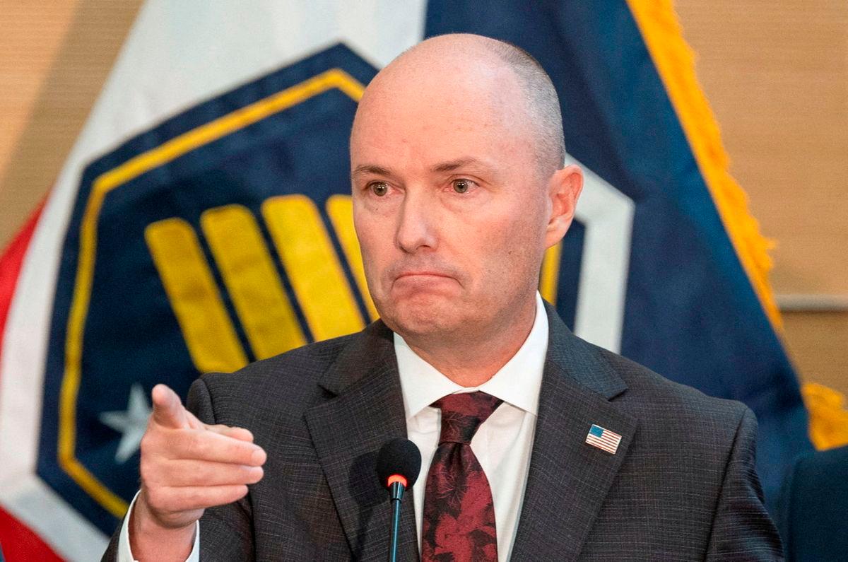 Utah Governor Spencer Cox gestures as he speaks during a press conference announcing details on the suspect in the shooting of U.S. conservative commentator Charlie Kirk, who was fatally shot during an event at Utah Valley University, in Orem, Utah, U.S. September 12, 2025. REUTERS/Cheney Orr TPX IMAGES OF THE DAY
