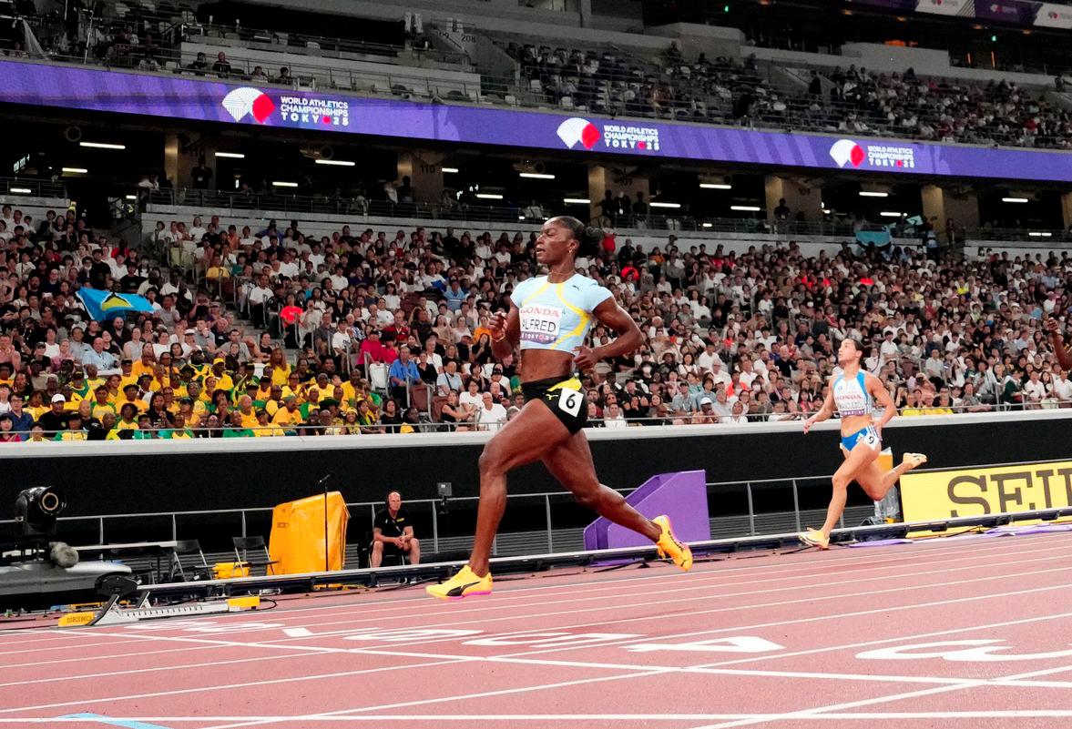 World Athletics Championships Tokyo 2025 - Women's 100m Round 1 - Japan National Stadium, Tokyo, Japan - September 13, 2025Saint Lucia's Julien Alfred crosses the line to win heat 4 - REUTERSPIX