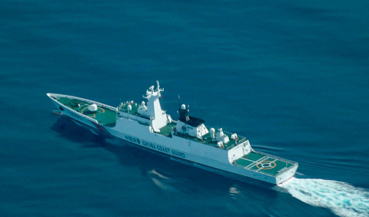 FILE PHOTO: An aerial view of a China Coast Guard ship navigating near the disputed Scarborough Shoal, in the South China Sea, August 13, 2025. REUTERS/Adrian Portugal/File Photo