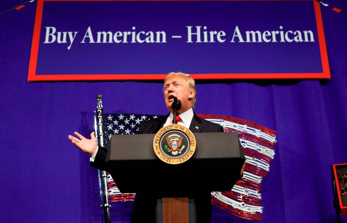 U.S. President Donald Trump speaks before signing an executive order directing federal agencies to recommend changes to a temporary visa program used to bring foreign workers to the United States to fill high-skilled jobs during a visit to the world headquarters of Snap-On Inc, a tool manufacturer in Kenosha, Wisconsin, U.S., April 18, 2017. - REUTERS