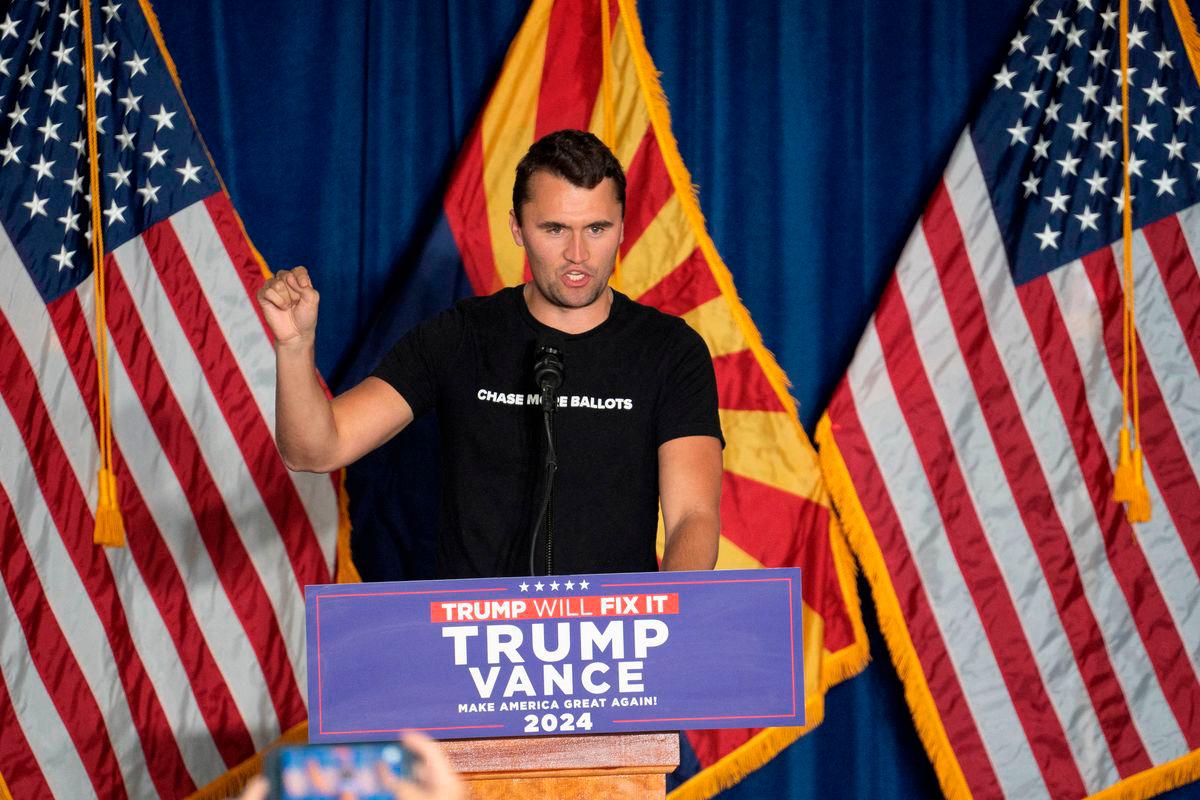 FILE PHOTO: Co-founder of Turning Point USA Charlie Kirk speaks during the rally of Republican U.S. vice presidential nominee Senator JD Vance in Scottsdale, Arizona, U.S. November 2, 2024. REUTERS/Go Nakamura/File Photo