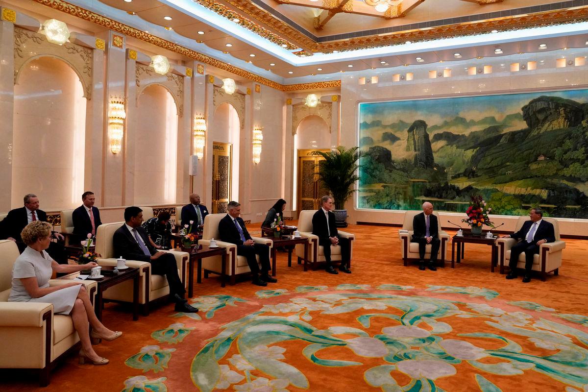 Rep. Adam Smith, (D-WA), speaks with Chinese Premier Li Qiang, as he leads a bipartisan group of U.S. lawmakers including Chrissy Houlahan, Democratic member of House Armed Services Committee, Ro Khanna, Democratic member of House Armed Services Committee, Michael Baumgartner, Republican member of House Foreign Affairs Committee and David Perdue, US Ambassador to China for a meeting at the Great Hall of the People in Beijing, China, Sunday, Sept. 21, 2025. Mahesh Kumar A./Pool via REUTERS