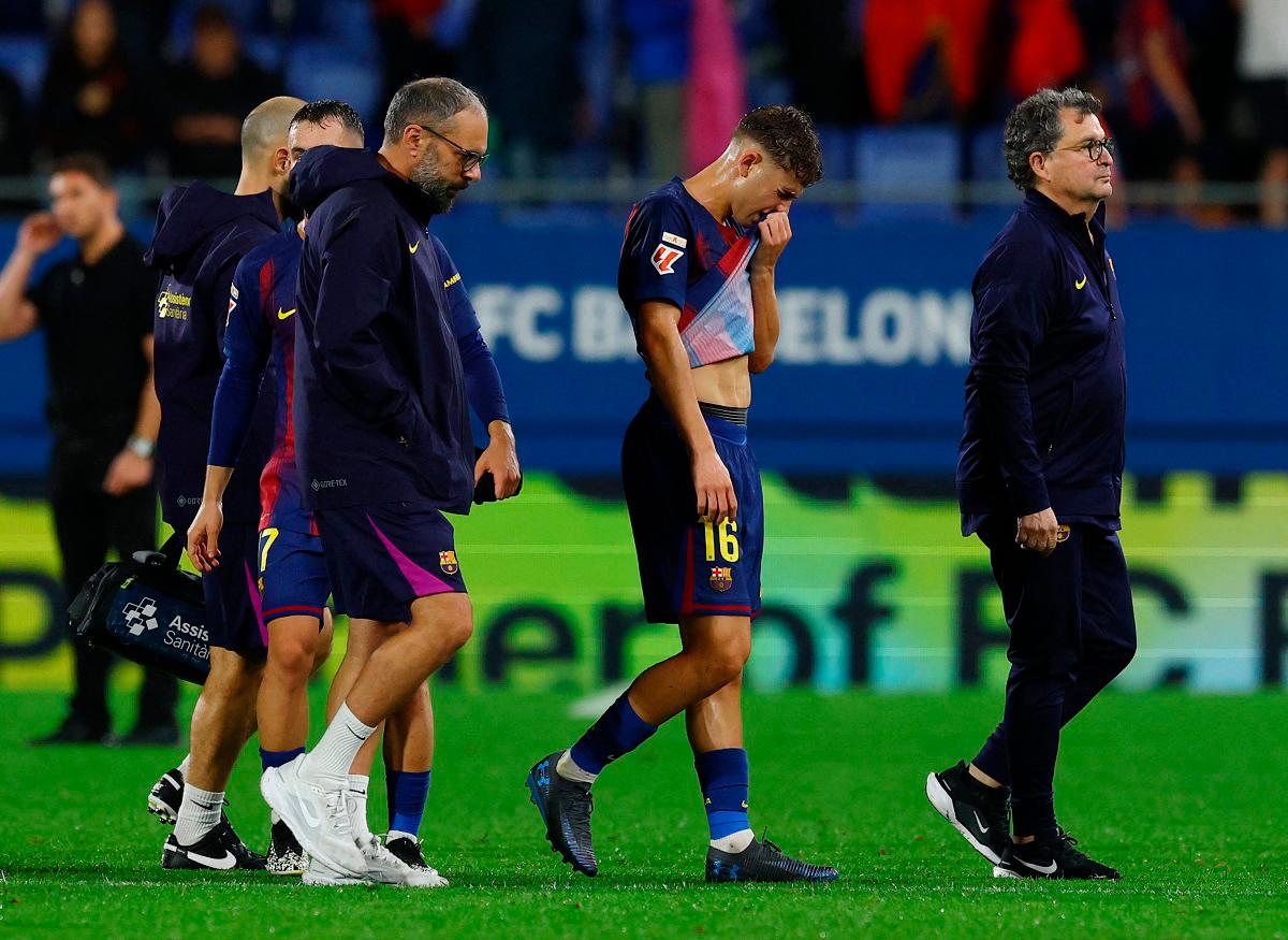 FC Barcelona’s Fermin Lopez reacts after sustaining an injury after the match REUTERS/Albert Gea