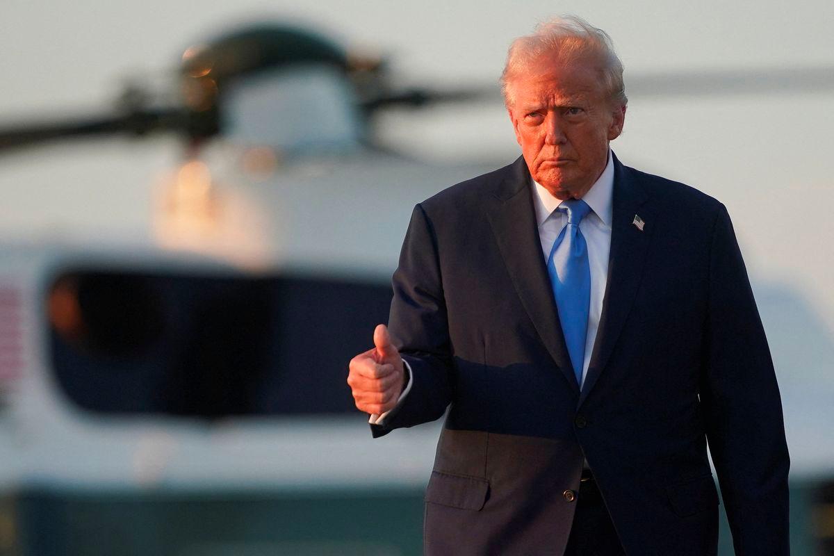 U.S. President Donald Trump walks with Marine One in the background, as he departs for New York City to attend the 80th United Nations General Assembly, at Joint Base Andrews, Maryland, U.S., September 22, 2025. - REUTERSPIX