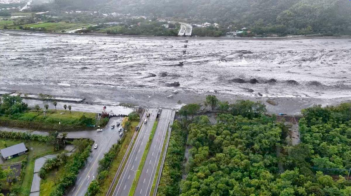 A drone view shows a collapsed bridge submerged in flood waters, in the aftermath of Super Typhoon Ragasa, in Guangfu township, Hualien County, Taiwan September 24, 2025 in this screengrab obtained from a video. The Warthog Air Squadron/via REUTERS